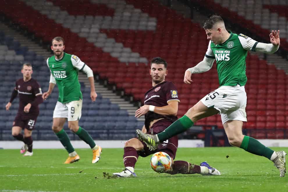 Hibernian’s Kevin Nisbet, right, took on Hearts just days after his father's death