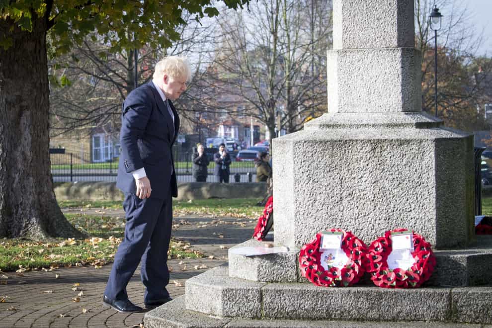Boris Johnson lays wreath