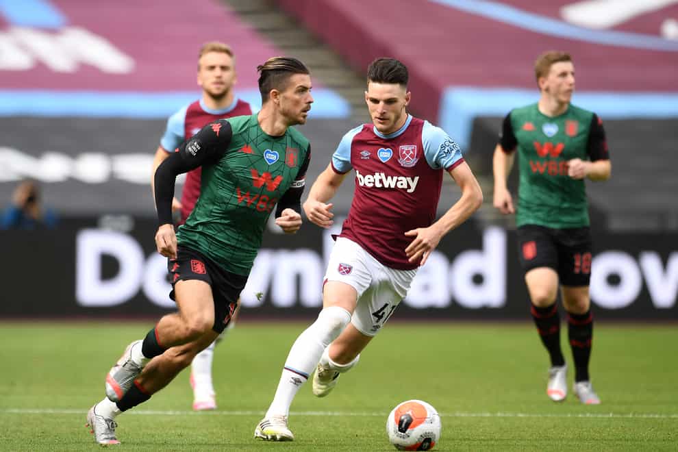Jack Grealish (left) and Declan Rice (right) were in the Ireland set-up prior to switching allegiance to England (Andy Rain/PA).