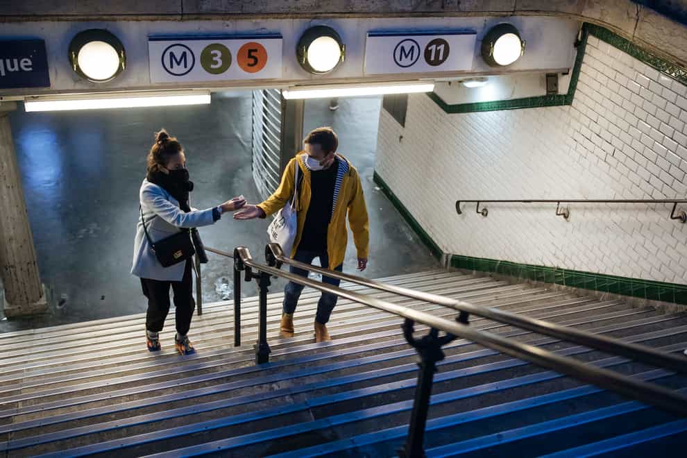 A couple in an underground station