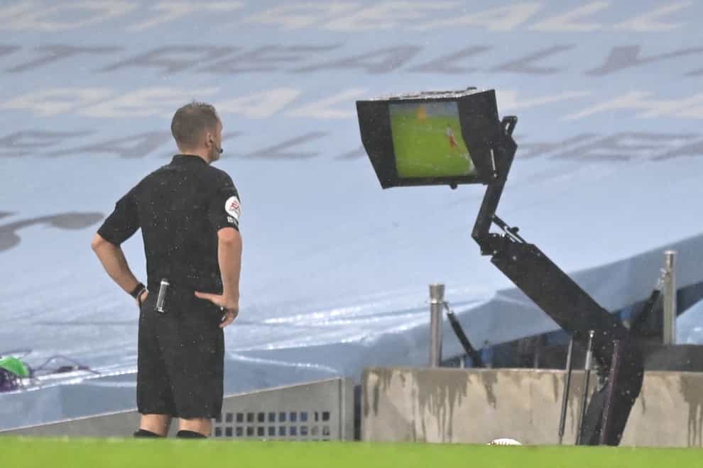 Referee Craig Pawson was one of a number of referees to consult his pitchside monitor over VAR calls