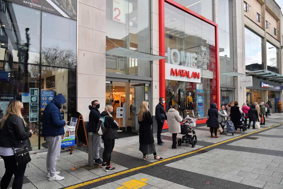 Shoppers queuing for Matalan in Cardiff, as restrictions are relaxed following a two-week 'firebreak' lockdown across Wales (Ben Birchall/PA)
