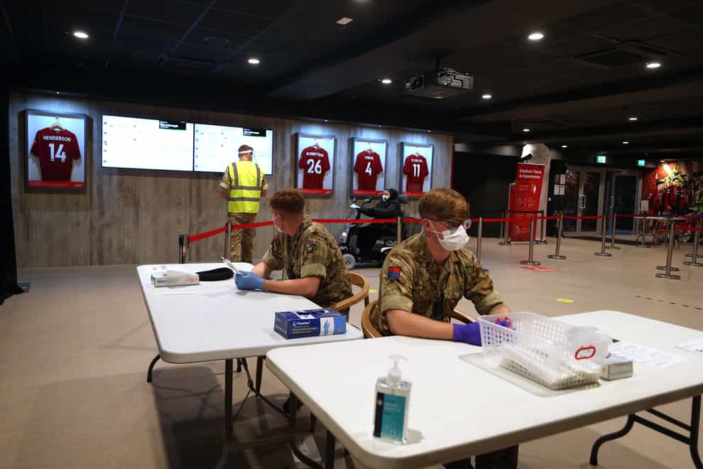 Members of the military use Anfield stadium as part of the mass testing taking place in the city of Liverpool