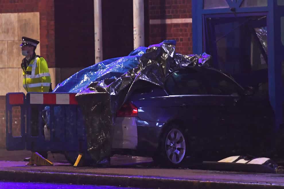 A man has been arrested after a vehicle collided with the police station