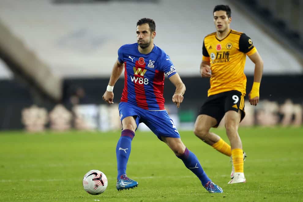 Crystal Palace midfielder Luka Milivojevic will miss Serbia's play-off clash with Scotland after testing positive for coronavirus.