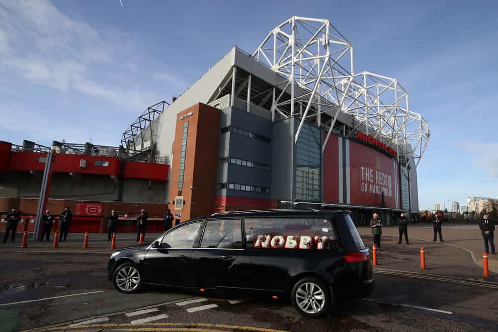 The hearse drove past Old Trafford before the service at Manchester Crematorium Southern Cemetery
