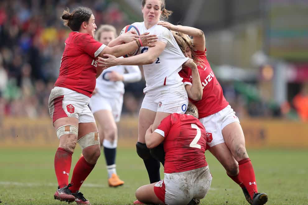 <p>Emily Scarratt (centre) is set to lead her squad at the weekend</p>