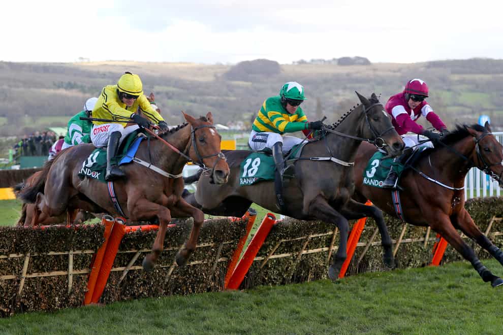 Saint Roi (middle) jumps the last flight on the way to winning the County Handicap Hurdle at Cheltenham