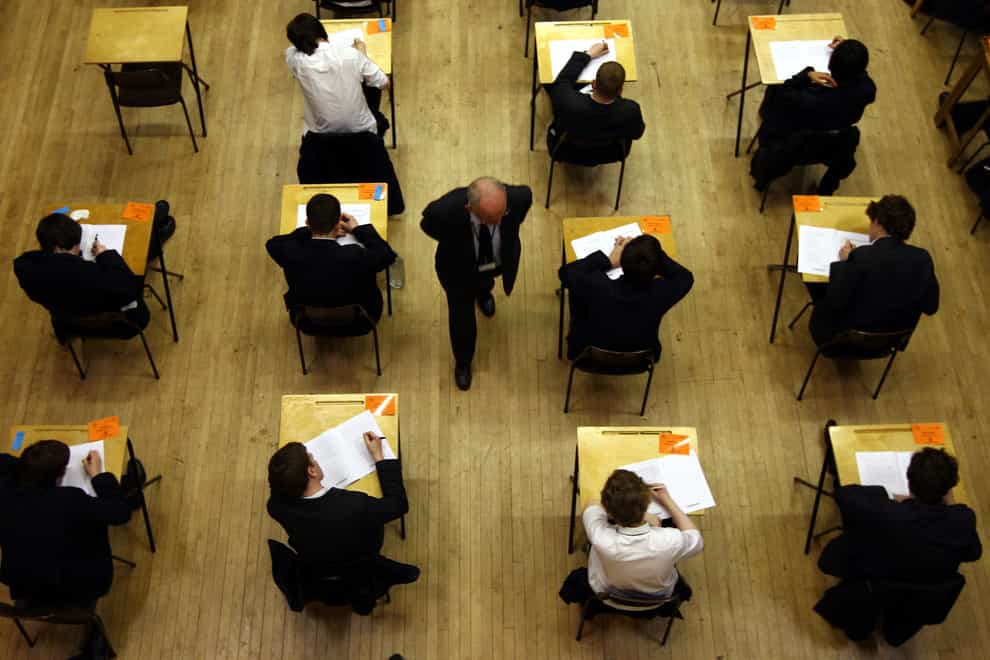 Pupils sitting an exam (David Jones/PA)
