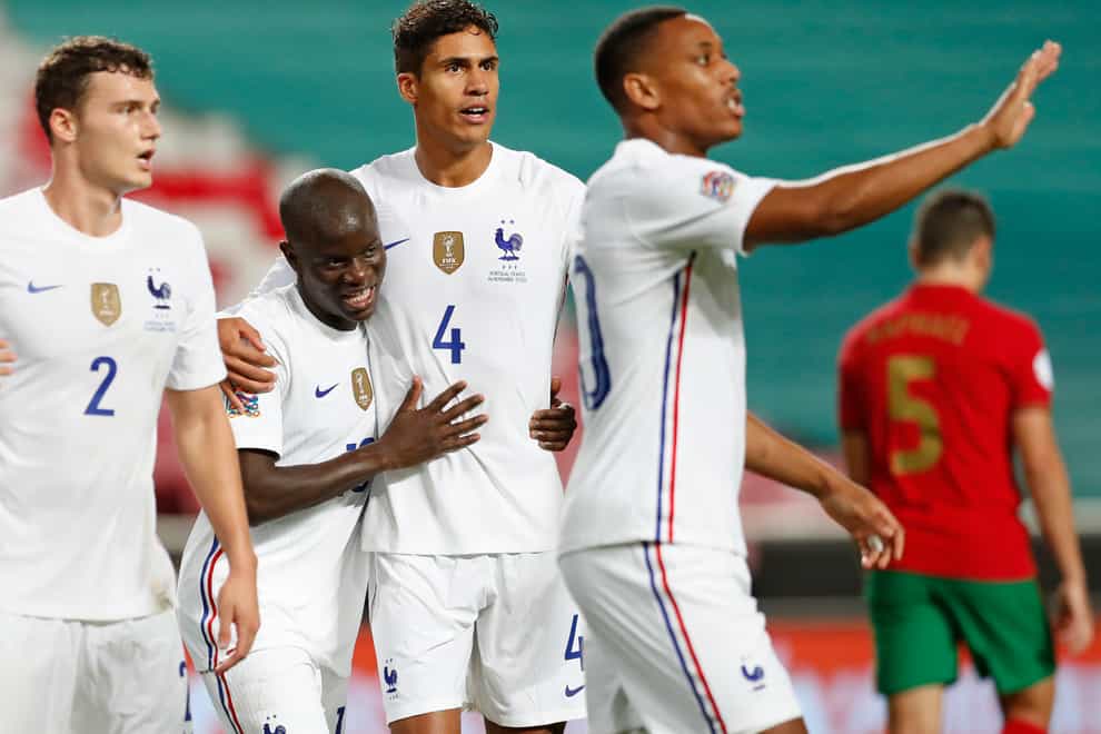 N’Golo Kante, second left, was on target as France beat Portugal in Lisbon