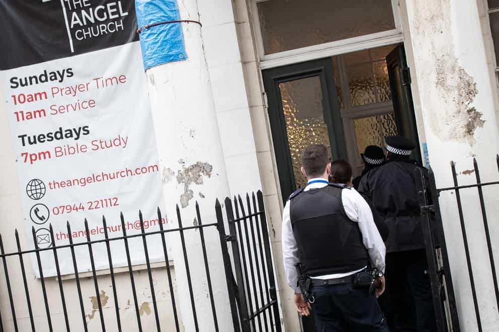 Police officers at the Angel Church in Clerkenwell