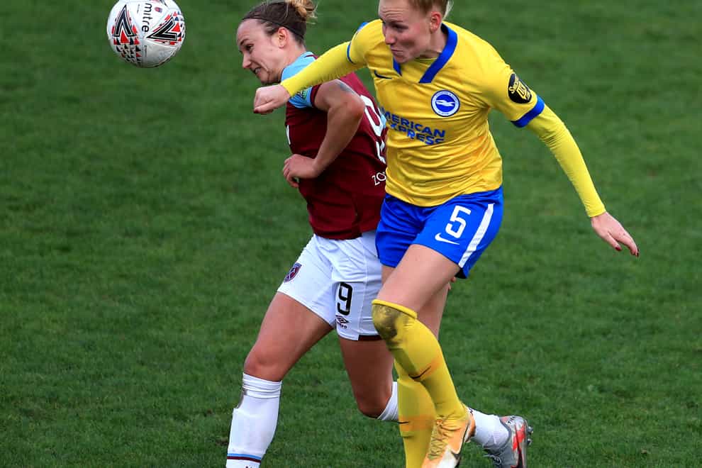 West Ham’s Martha Thomas (left) and Brighton’s Danique Kerkdijk battle for the ball during Brighton's 1-0 win in the Women’s Super League.