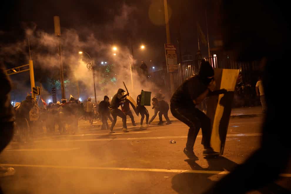Police launch tear gas to disperse protesters