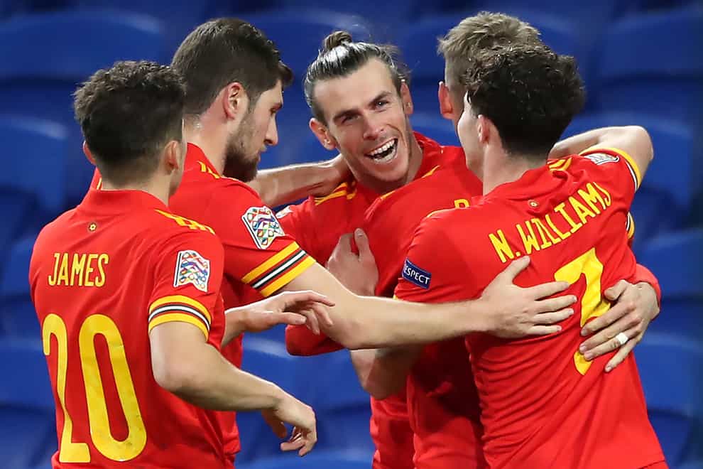 Gareth Bale (centre) and team-mates celebrate David Brooks' goal against the Republic of Ireland in Cardiff