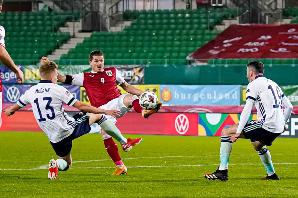 Ali McCann, left, made his Northern Ireland debut in the Austria defeat