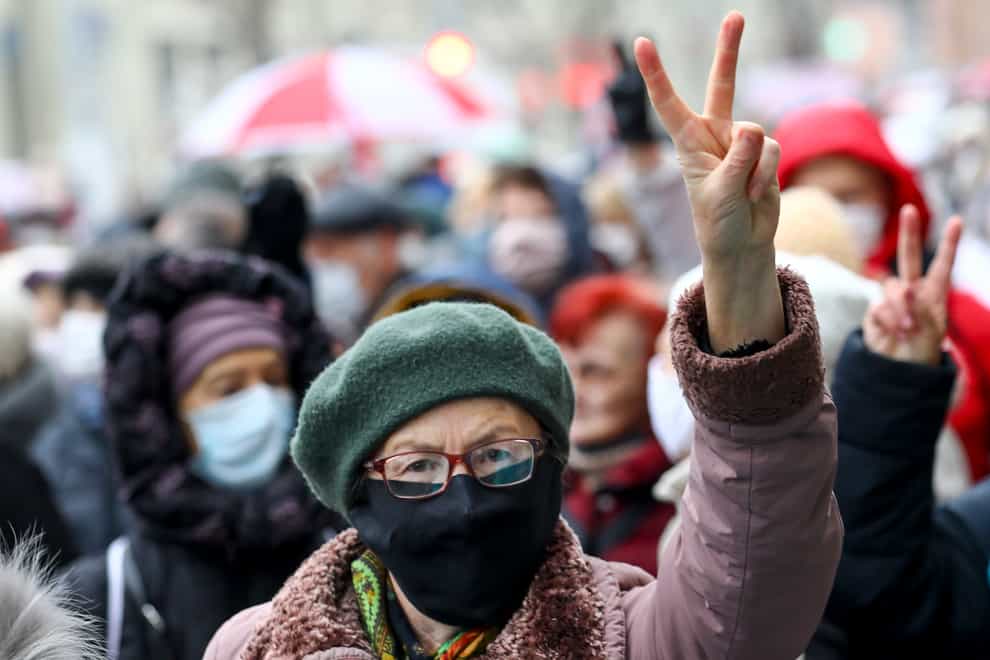 A woman gestures as she attends a pensioners’ opposition rally in Minsk