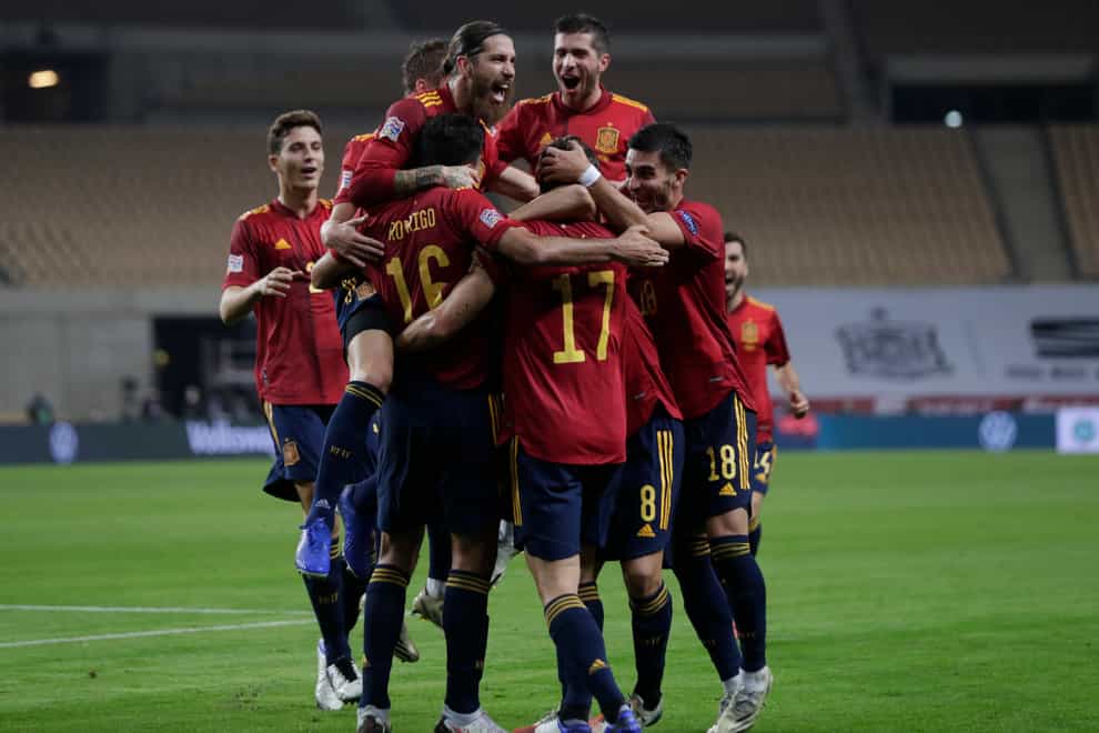 Spain’s players celebrated a memorable win over Germany