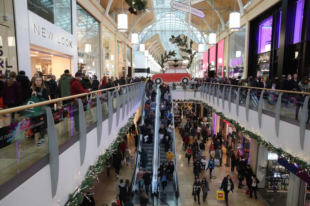 People in St David’s shopping centre in Cardiff on the first weekend after the firebreak lockdown ended (Nick Potts/PA)