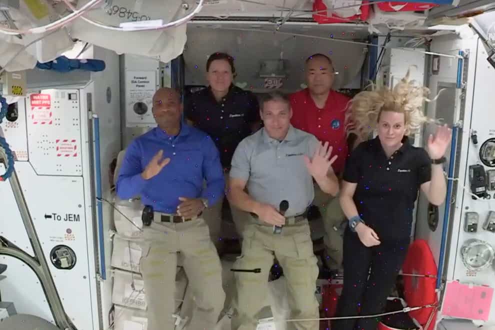 Nasa astronauts from left to right pilot Victor Glover, mission specialist Shannon Walker, Crew Dragon commander Michael Hopkins, Japan Aerospace Exploration Agency (JAXA) astronaut and mission specialist Soichi Noguchi and flight engineer Kate Rubins
