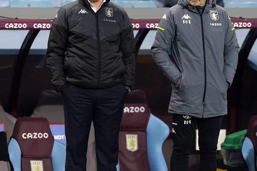 Aston Villa manager Dean Smith, left, against Brighton
