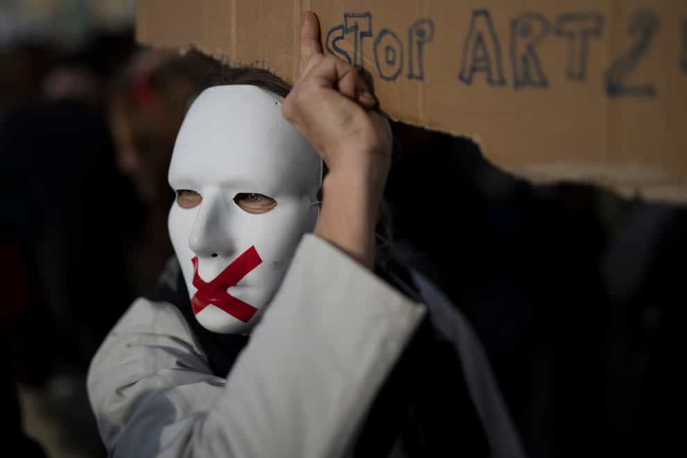 A protester in a mask