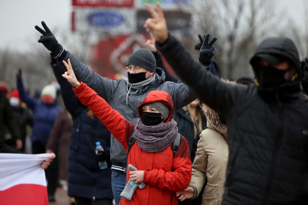 Demonstrators wearing face masks during an opposition rally in Minsk