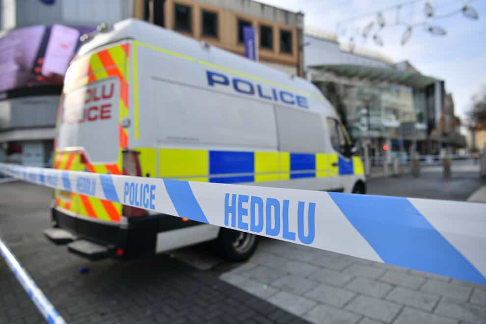 A police van and police tape in Cardiff city centre