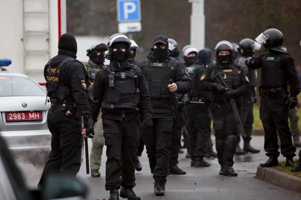 Belarusian riot police gather to block demonstrators
