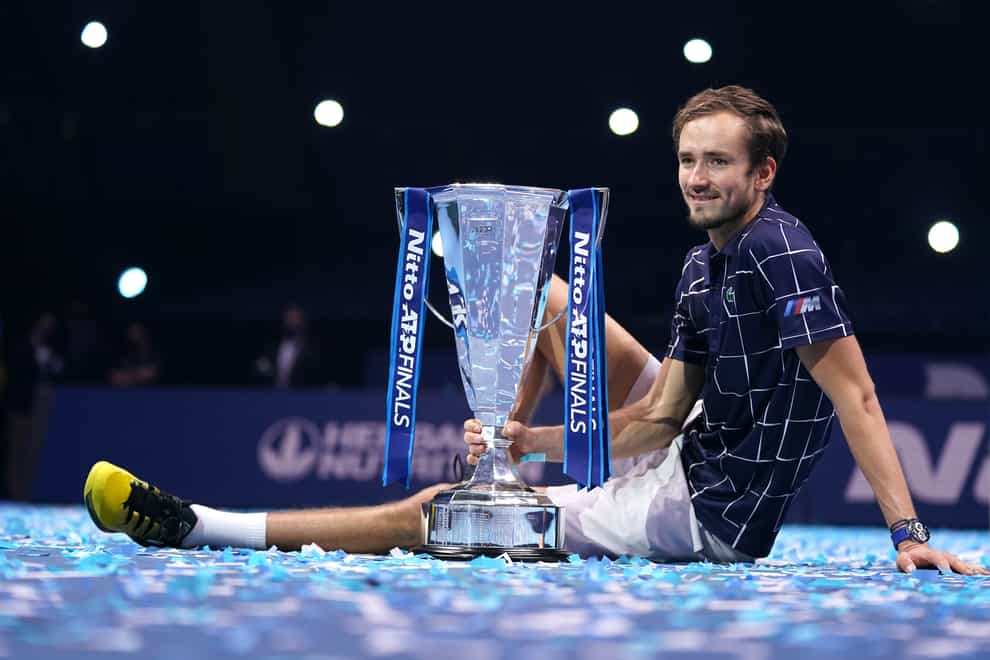 Daniil Medvedev poses with the Nitto ATP Finals trophy