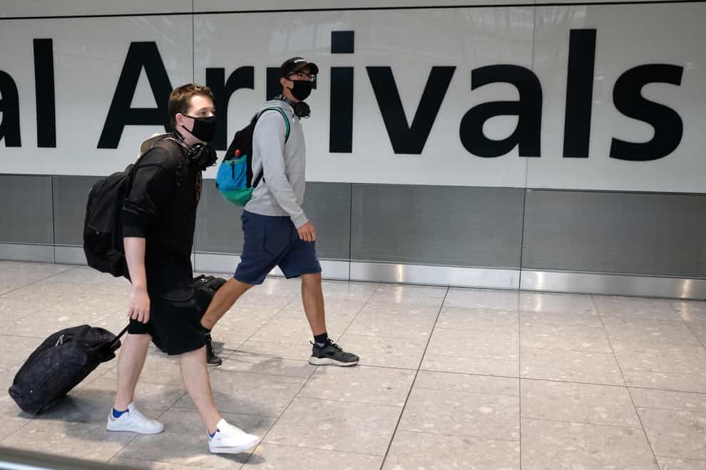 Travellers arriving in England will be able to end their quarantine with a negative coronavirus test after five days from December 15, Transport Secretary Grant Shapps has announced (Andrew Matthews/PA)
