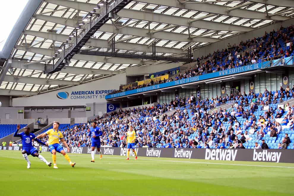 Socially-distanced Brighton fans watch their team in a pre-season friendly against Chelsea