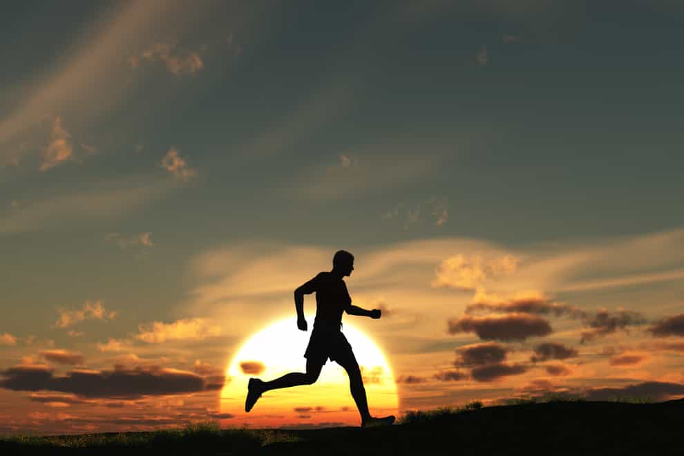 Man running at dawn