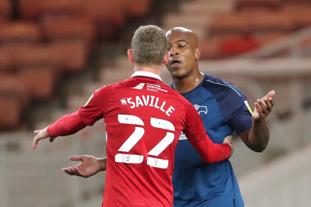 Middlesbrough’s George Saville exchanges words with Derby's Andre Wisdom