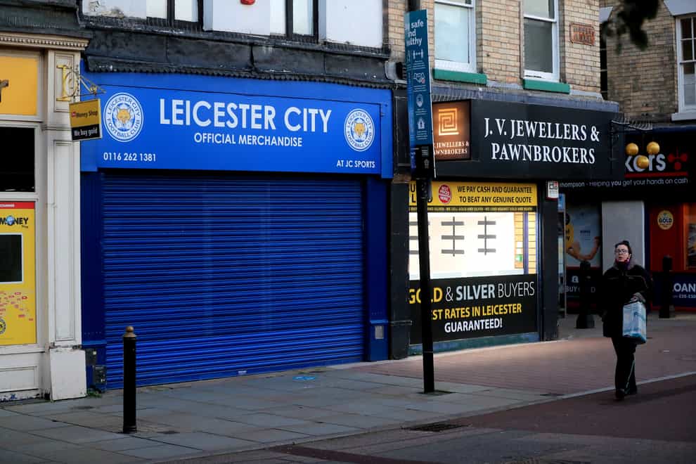 Shutters are closed outside shops in Leicester (Mike Egerton/PA)