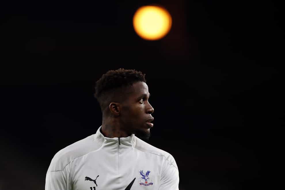Crystal Palace forward Wilfried Zaha continues to self-isolate