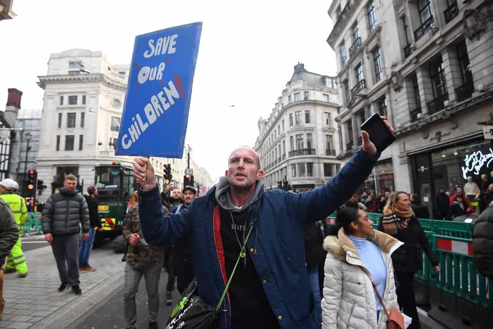 <p>Demonstrators during an anti-lockdown protest at Oxford Circus&nbsp;</p>