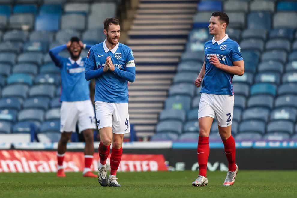 Tom Naylor (centre) scored a memorable goal as Portsmouth claimed a convincing win over King’s Lynn Town at Fratton Park