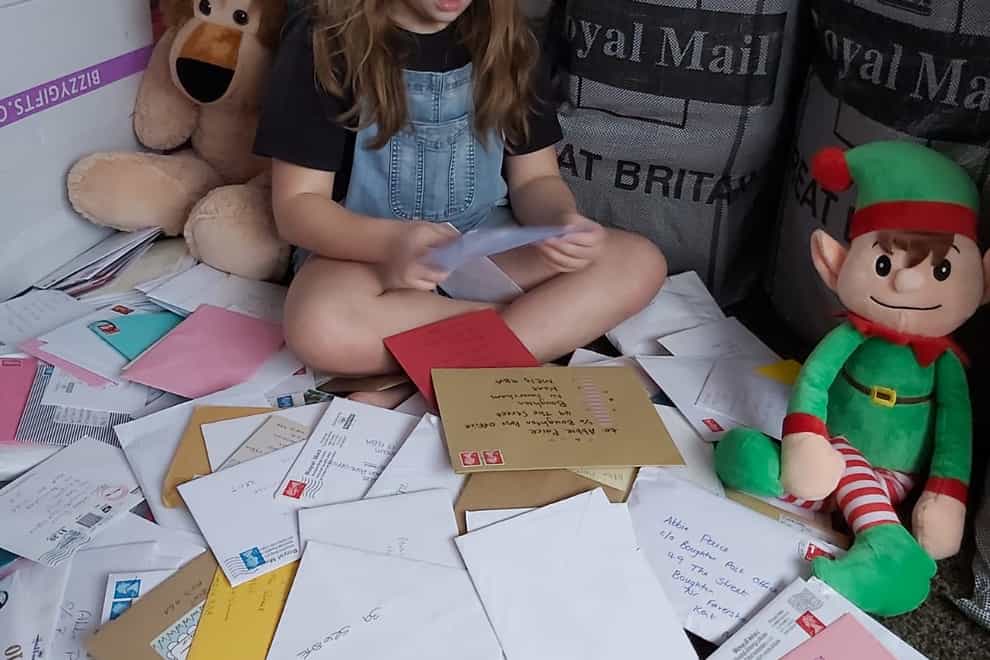 Abbie Paice with the thousands of cards and gifts she has received