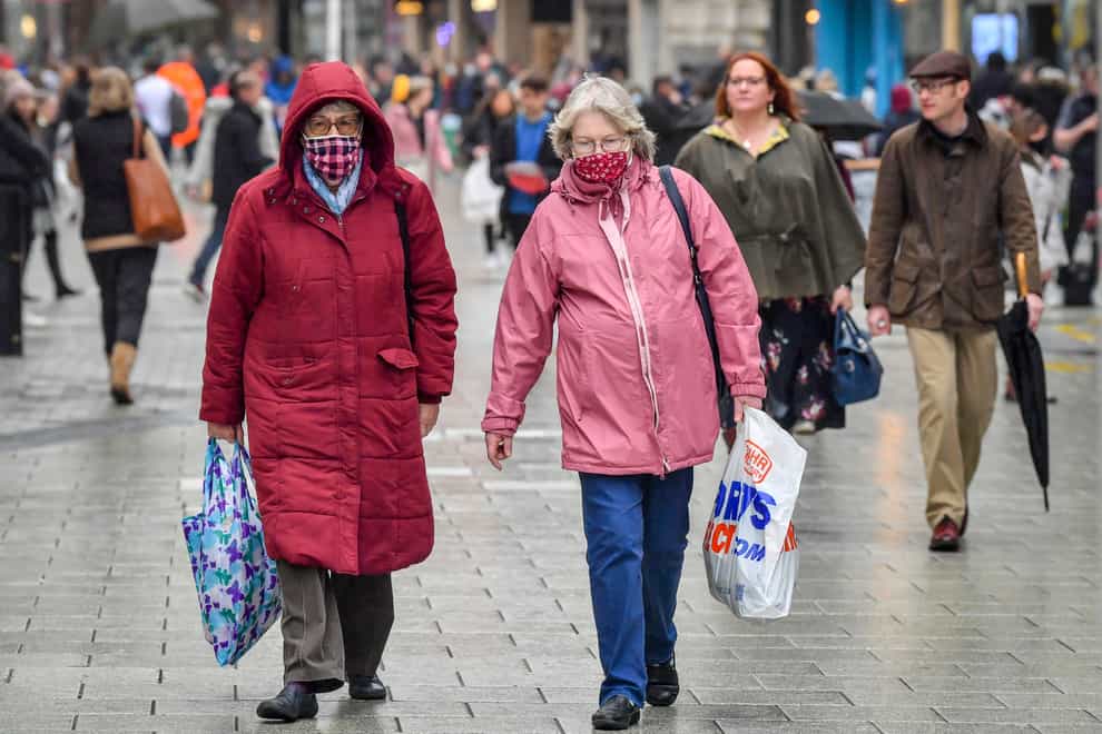 Shoppers wear face coverings