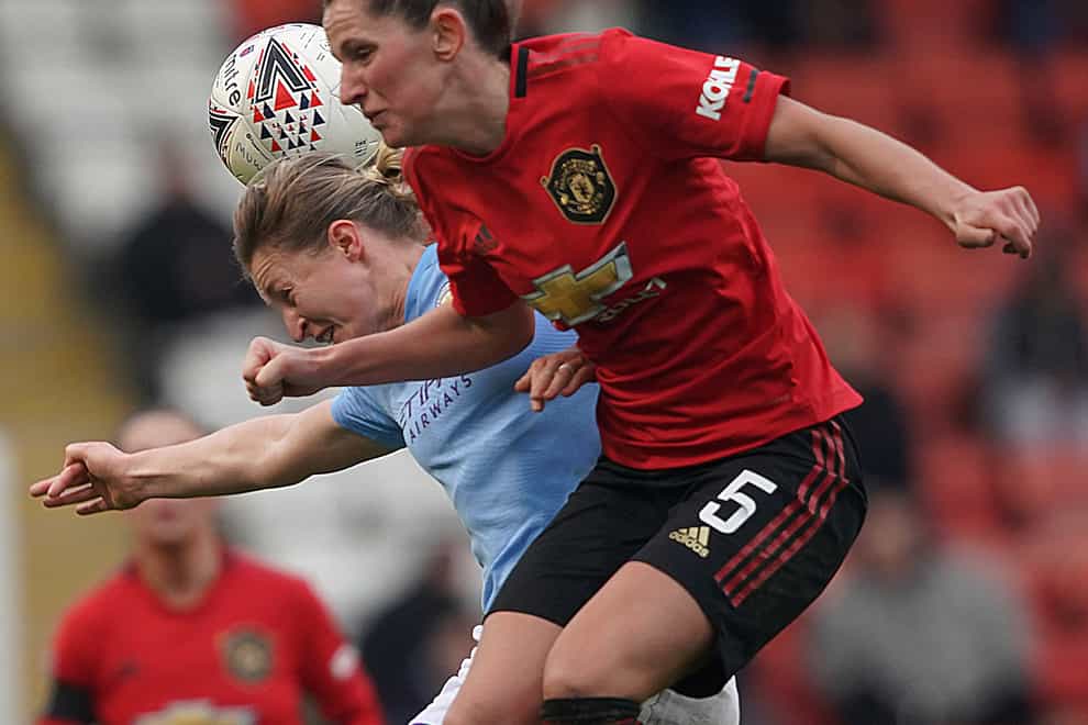 Manchester United defender Abbie McManus (right) has been handed an England squad call-up.