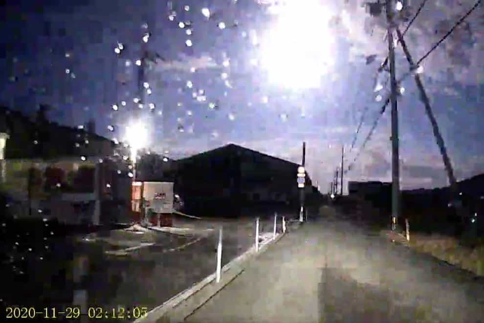 A brightly burning meteor over Japan