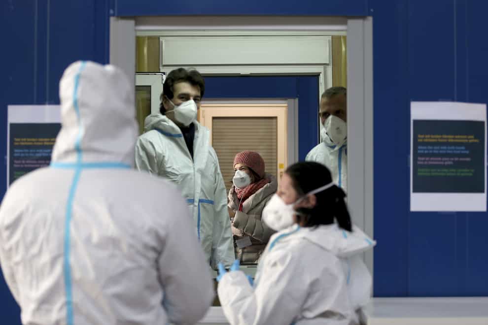 Medical workers at a site for coronavirus testing in Vienna