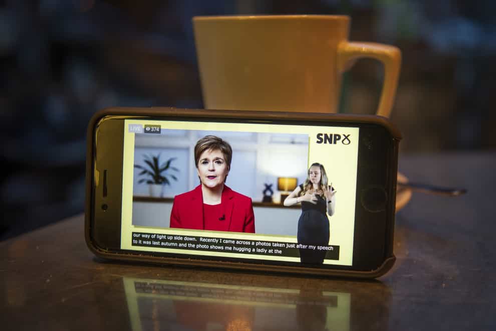Nicola Sturgeon as seen on a smartphone during the virtual conference