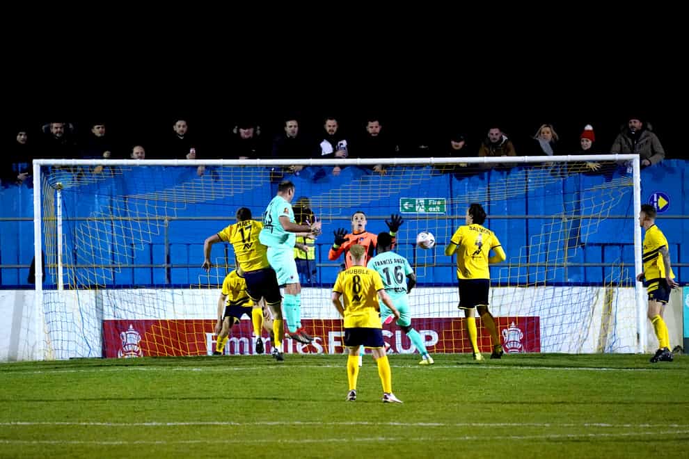 Boreham Wood’s Matt Rhead (second left) scores his side’s third goal