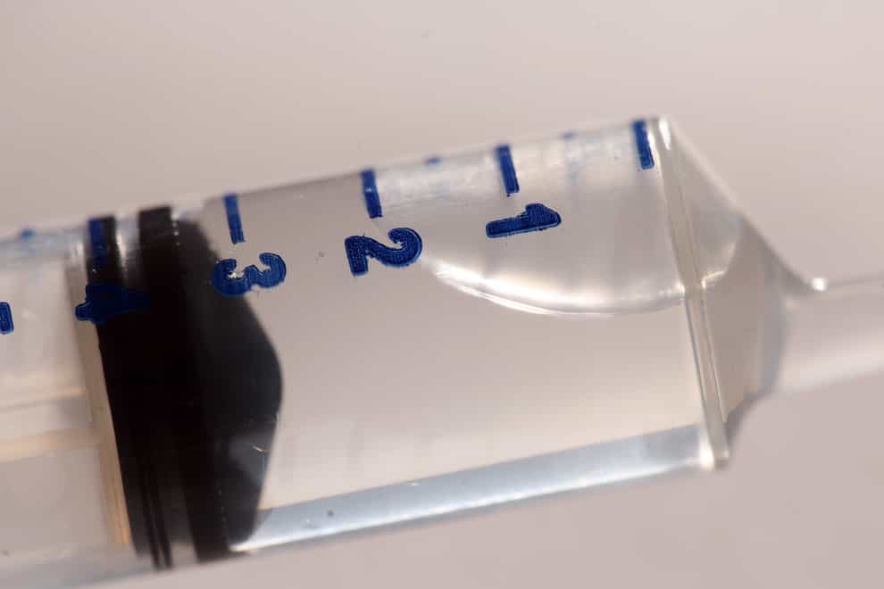 A syringe (Martin Keene/PA)