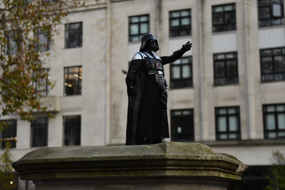 Darth Vader figurine on Edward Colston plinth