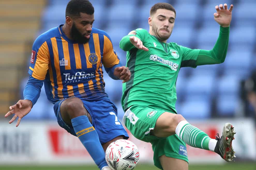 Ethan Ebanks-Landell (left) is set to return to the Shrewsbury squad this weekend