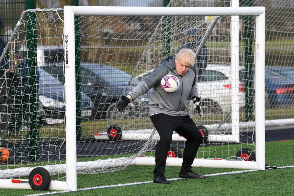 Boris Johnson tries out as a goalkeeper on the 2019 General Election campaign trail in December 2019