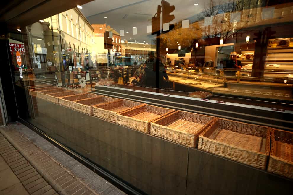 Empty baskets in a bakery (Tim Goode/PA)