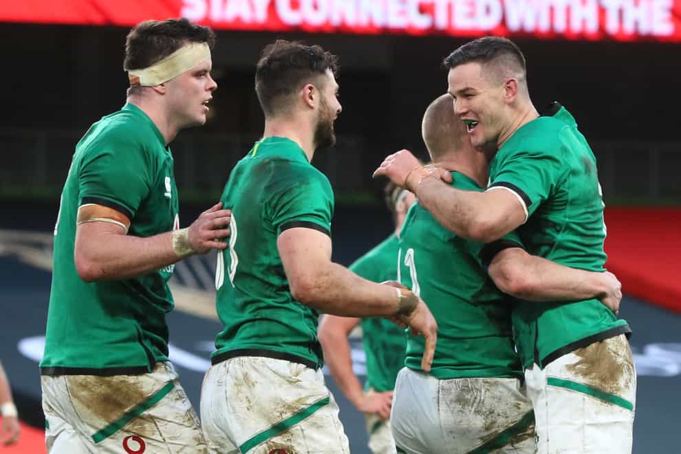 Keith Earls, centre right, celebrates his first try with team-mates